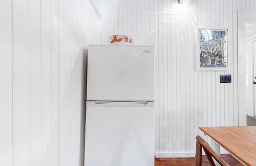 Camden Cottage | Wooded home on the pond with WiFi, wood stove, full Kitchen, loft, bunks, & dock