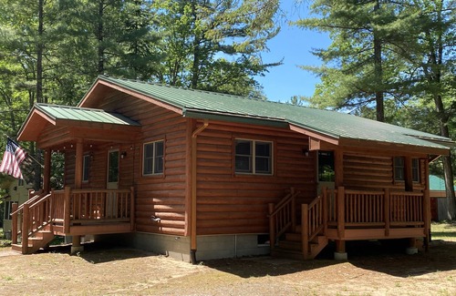 Topinabee Cottage | Wooded property in Northern Michigan. Great location for ice fishing on Mullett!