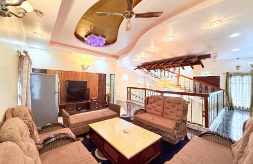 Kammanahalli Villa | Wooden Whispers Traditional Luxe Spacez Villa