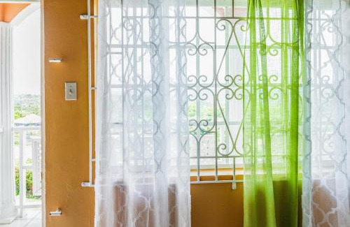 Montego Bay Villa | YanceyLargo-6BR Two-Story Estate with Mountain Views