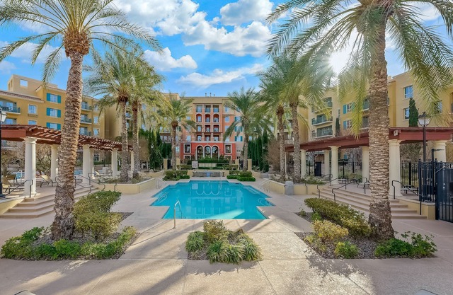 1 Bedroom with view of lake, pool at Lake Las Vegas
