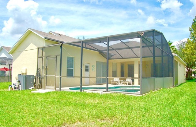1103 Executive 5 bedroom, 3 bath West facing pool with conservation view .