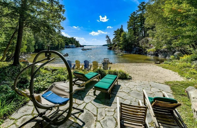 1300' of Ultra Private Frontage! 3bed 2bath! Waterfall! Tennis Court!