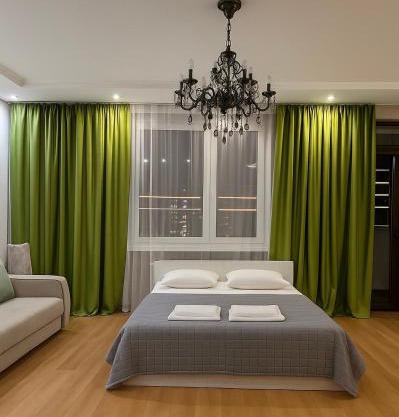 153 Очень теплые и уютные апартаменты с видом на Байтерек и поющие фонтаны с 2 кроватями и диваном