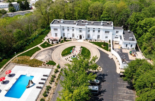 1917 Historical Mansion with Outdoor Pool on 5 acres in the middle of the city.