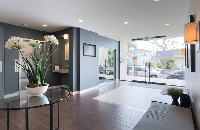 2 BR Oasis w/Den Including Pool, W/D, Parking, & Fitness
