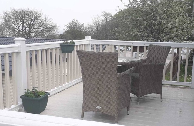 20 Glade holiday lodge rental with verandah, Bideford Bay Holiday Park