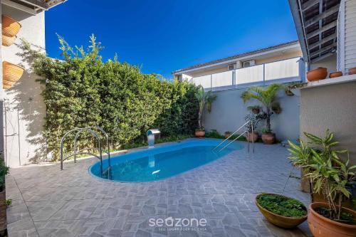 2BR house w/pool & BBQ in Penha – TZS210