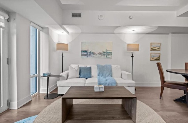 2BR Modern Condo with City Skyline Views & Pool