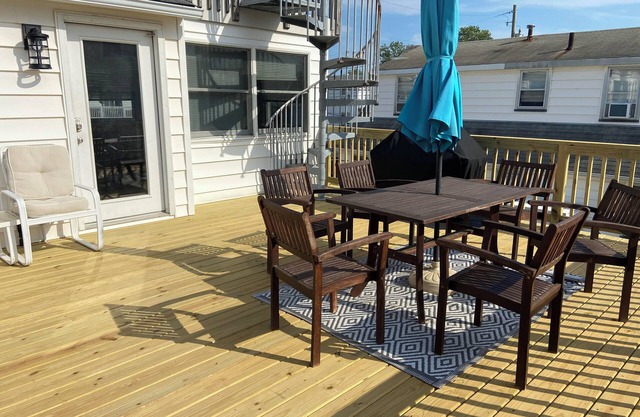 2nd floor unit with private deck available the last week of August!