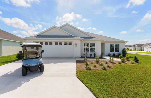 3/2 in The Village of Waters Edge w/Golf Cart
