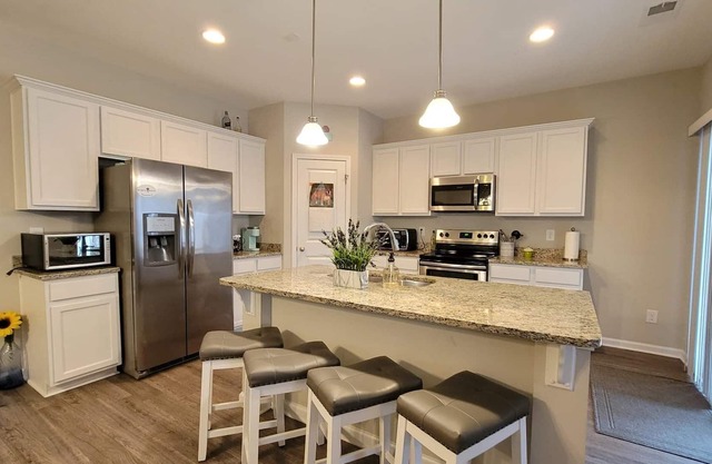 3 bedroom, 2 full bath with 2 car garage and private backyard