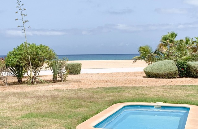 39 Beautiful beachfront villa with private garden and pool in 5* resort
