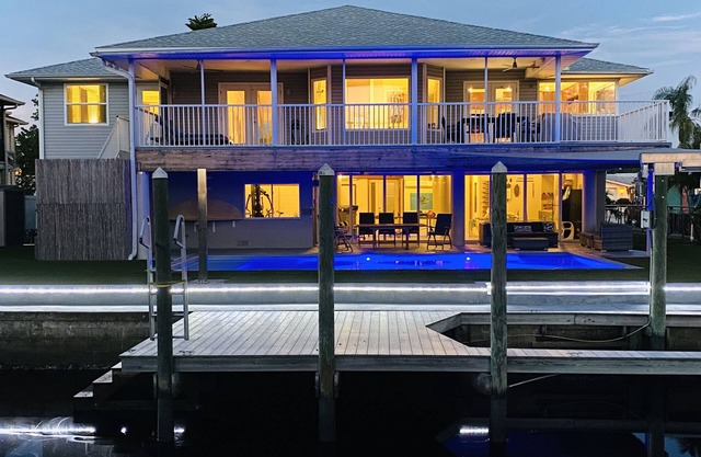 3900 SQFT waterfront home; heated pool;Game room & gym near Gulf-Islands beaches