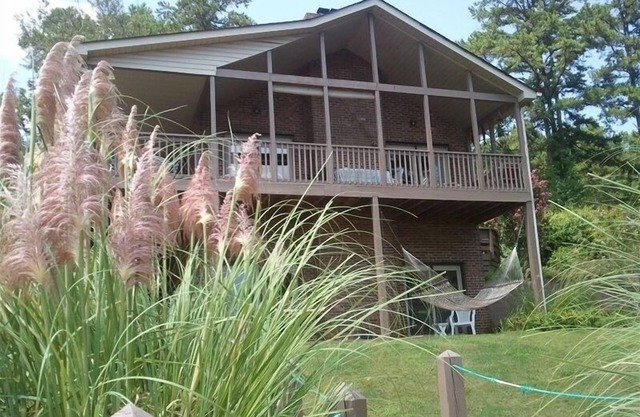 4/3 Waterfront Home w/Covered Dock, 2 Decks, Pet Friendly. Long view on lake.