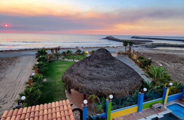 5 bedrooms Beachfront Pool Spa grassy yard 24-7 security.