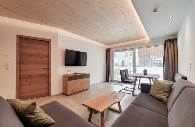 50m² modern vacation apartment with terrace, free bathing lake, 100m to the ski area