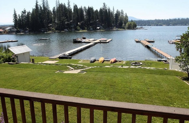 60 Feet Of Sandy Waterfront With Large Lawn, Spacious Deck And Beautiful Views.