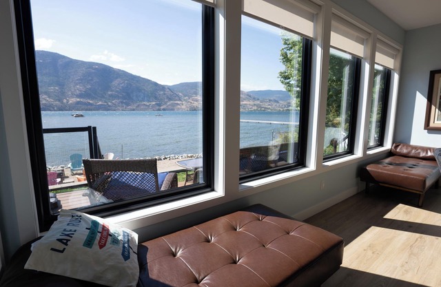80ft of private beach, lakefront with mountain views right on Skaha Lake!