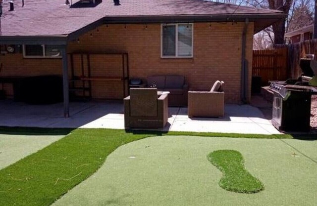 8673 W 63rd Pl · Golfers Dream! Sweet NW location.