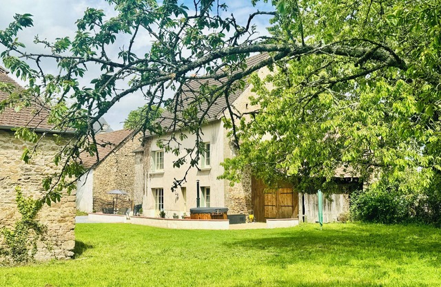 A cosy, spacious, well equipped 3 bedroomed farmhouse with wood-fired hot tub!
