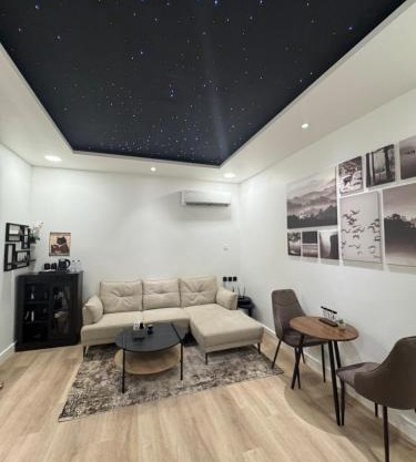 A hotel apartment consisting of a bedroom and a living room