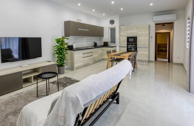 A lovely 1BR home with Balcony off the coast.