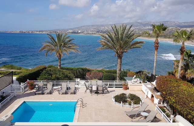 A luxury detached seafront villa with heated swimming pool & stunning views