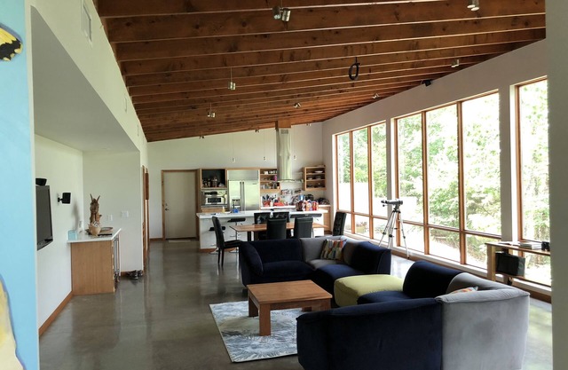 A modern home nestled on the cliffs of Greers Ferry Lake.