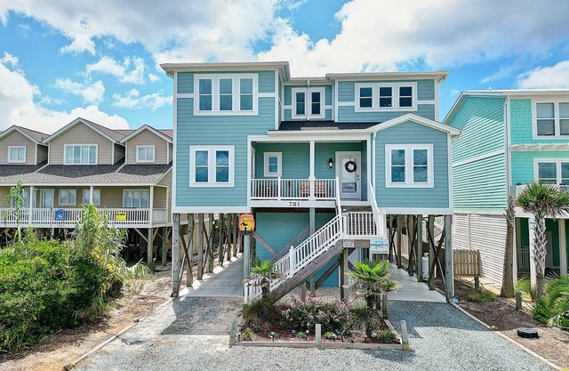 "A Perfect Landing" is a 6 Bedroom/6.5 Bath Home w/Private Pool & Elevator.