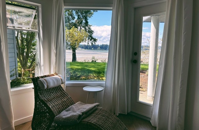 A quiet oceanfront hideaway on the shoreline of Nanoose Bay. n