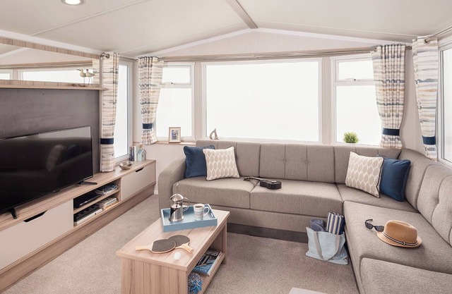 A spacious open plan holiday home with one master double and two twin bedrooms.