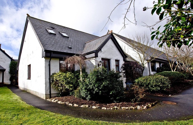 A spacious, three-bedroom property with a stylish wraparound terrace.