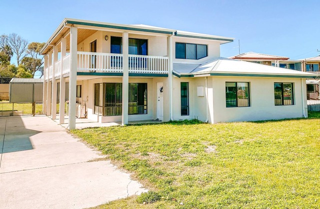 A stunning, spacious and modern two-storey holiday home with ocean views.