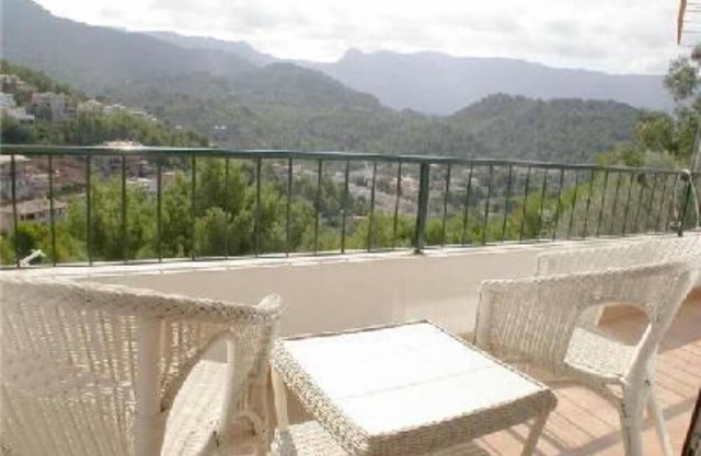Accommodation on harbor and beach with mountain views