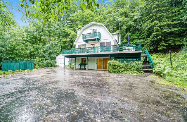 Adorable home with private balcony & wraparound deck