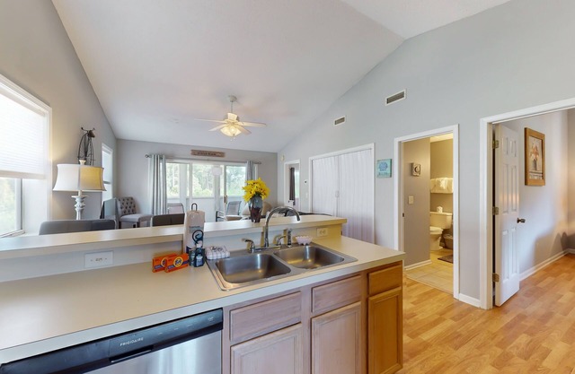 Airy condo in a great location with balcony, W/D, and pool access - dog-friendly