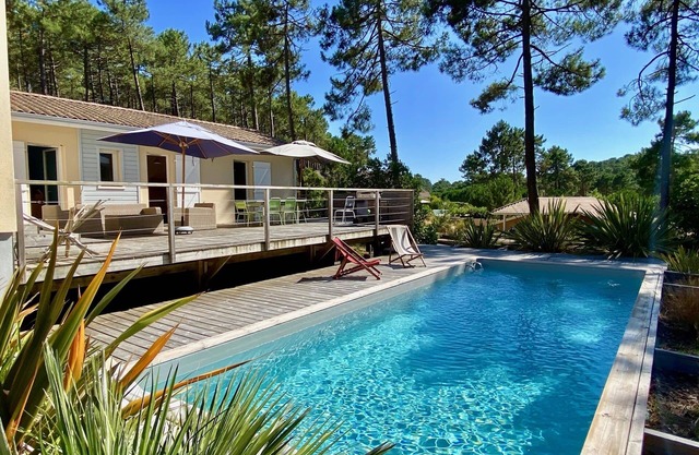 Amazing villa with pool and golf views, spacious pool area with wooded deck