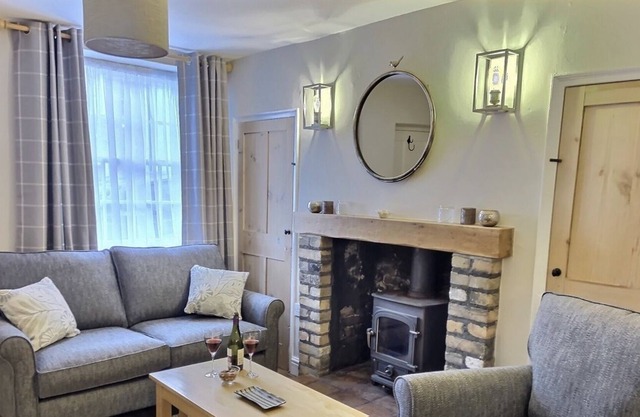 An iconic flint terraced cottage centrally located in the heart of Holt