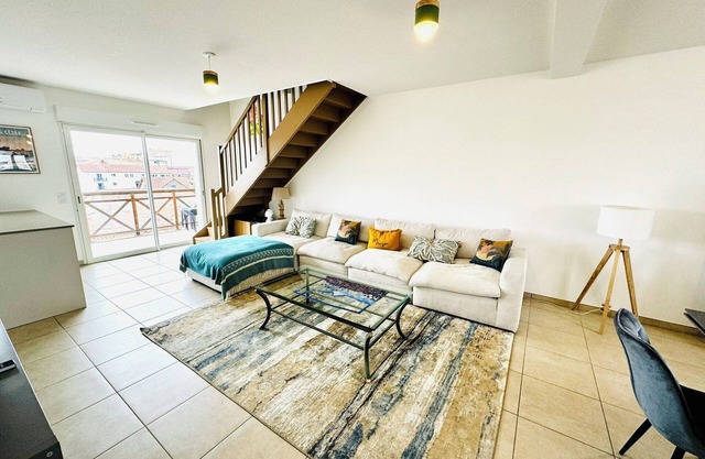 Apartment 'Superbe Duplex Au Pied De La Plage' with Private Terrace, Wi-Fi and Air Conditioning