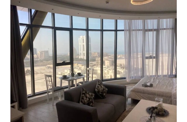 Apartment with a city view. Manama, Seef.