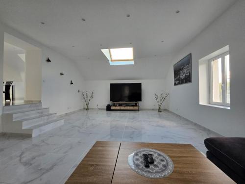 Appartement 150m2 avec jardin 3000 m2