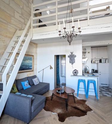 Appartement de charme sous les toits avec vue sur la Garonne