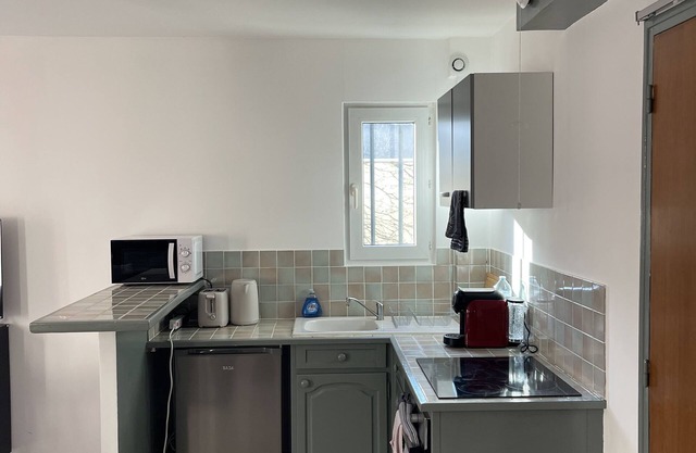 Appartement F2 Proche Paris Accessible et Tranquille