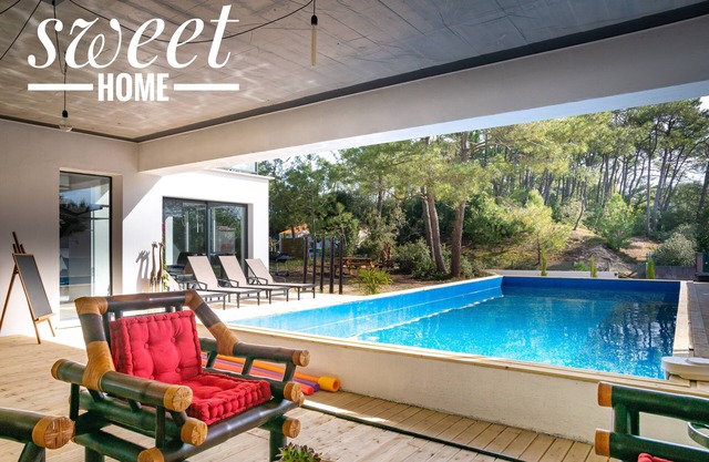 architect house with heated pool, 250m from the beach, facing the forest
