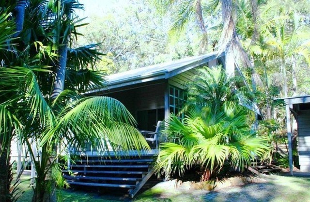 Architecturally designed beach house with a private covered north facing...