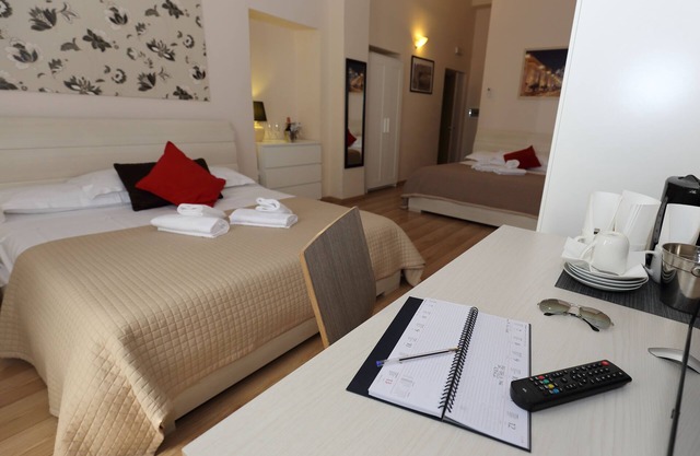 Aria Rome Rooms quadruple room with balcony overlooking Basilica di San Giovanni