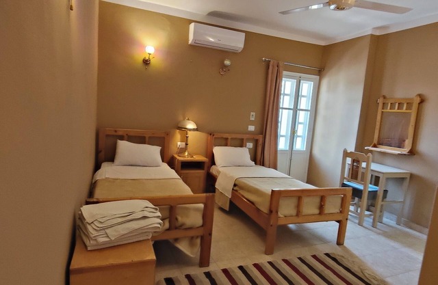 Authentic 7-Room Hotel with Nile Temple and Mountain Views – AC and WiFi
