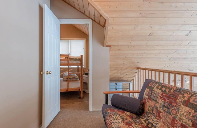 Authentic Ski Chalet w/Gas Fireplace & Hot Tub backing onto Alpine Chairlift
