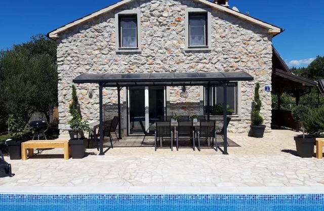 Authentic stone house with great pool and large garden!